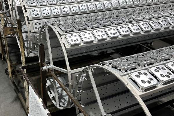 An assembly of ABL reflectors for automotive lighting, produced at Spartek.