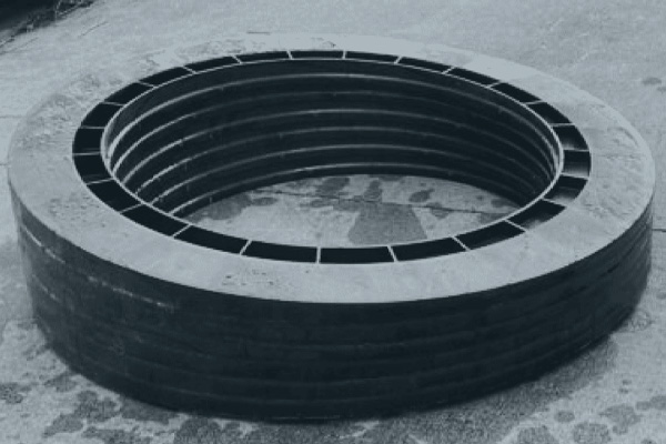 A stack of Ladtech Manhole Adjusting Rings.